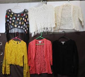lot 94 image: PonchoShawls ranging in sizes small to medium
