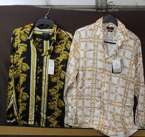 lot 118 image: Dress shirts with tags still on them Size large regular fit brand Zara