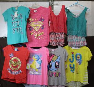 lot 119 image: Kids T-shirts most have tags still on them  size 14 kids