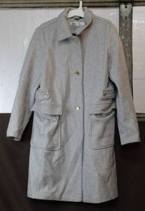 lot 127 image: Long coat size large brand is Kenneth cole new York