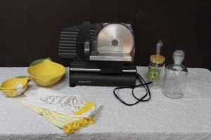 lot 98 image: Meat slicer and lemon bowls and hand towels teenage mutant Ninja turtles and more see pictures