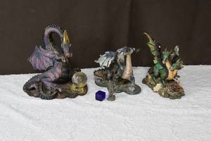 lot 99 image: 4-Dragon figures and a blue cube check all pictures some have damage