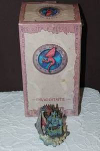 lot 109 image: Dragon figure and fairy figure took fairy figure out to show pictures see all pictures