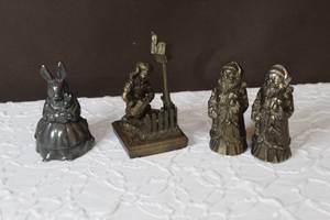 lot 140 image: Bunny music box  Drury Studios Collection, little girl and Santa Claus salt and pepper shakers all have wait to them