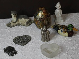 lot 142 image: Mixed figurine  like wood duckvintage Satsuma egg, likely of Japanese origin.wolf figurine and much more see pictures