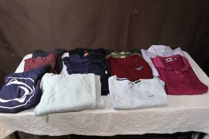 lot 164 image: Mixed lot of shirts and one pair of sweatpants brands like Calvin KleinHollisterpolo ranging in small to large