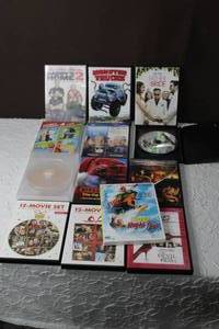 lot 193 image: Lot of DVDS some movies like father of the bridezookeeperClifford the big red dogsurf ninjas12 movie sets  and many more see pictures