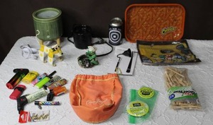 lot 203 image: Random mix lighted oil warmers crocodile ashtrayhideaway canM&M bag and much more see pictures