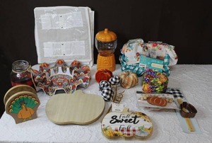 lot 219 image: Mixed lot pumpkin candy dish  wood pumpkin lazy Susan  taco tray and much more see pictures