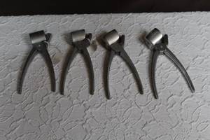 lot 260 image: 4-pliers-style nutcracker designed for various nuts like pecans and walnuts.
