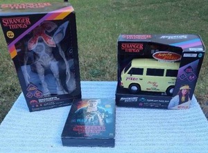 lot 283 image: stranger things Demogorgon remote control figure surfer boy pizza van remote control and the dvd