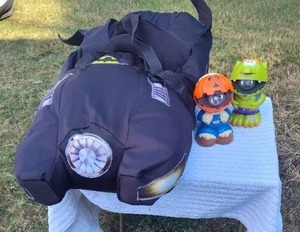lot 284 image: Batman car costume and two Halloween flashlights