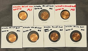 lot 38 image: Seven (7) UncirculatedMint State (MS) Lincoln Shield Cents - 2015-D, 2019-D,(x2) 2021-D, &amp (x2) 2022-D