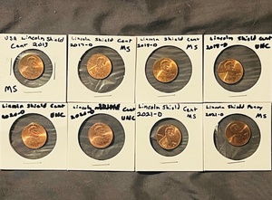 lot 40 image: Eight (8) UncirculatedMint State (MS) Lincoln Shield Cents - 2013, 2017, (x2) 2018-D, (x2) 2020-D, &amp (x2) 2021-D