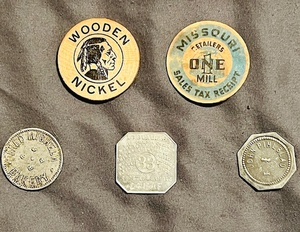 lot 45 image: Five (5) AntiqueVintage Tokens - Micheals Bakery, John Pihlblad, Ivory Soap, Wooden Nickel, &amp Missouri State Tax Receipt (Bid is times the quantity of 5)