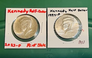 lot 53 image: Two (2) Kennedy Half- Dollars - 2023-P Mint State (MS) &amp 1997 Almost Uncirculated (AU)