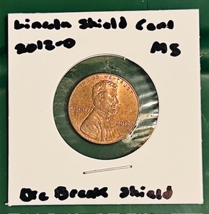 lot 94 image: 2012-D Lincoln Shield Cent WRARE Die Break in Shield Error