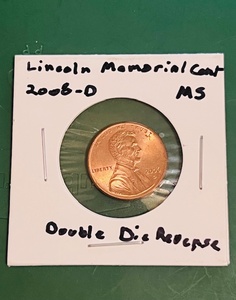 lot 122 image: 2006-D UncirculatedMint State Lincoln Memorial Cent WDouble Die Reverse (DDR) Error