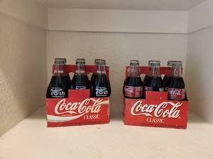 lot 4 image: Selection of 2 Collectible 6-pack of Redwings Coke bottles
