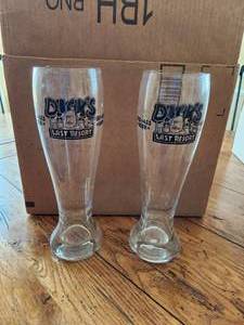 lot 10 image: Collectible Dicks Last Resort beer glasses