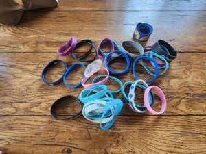 lot 82 image: Selection of rubber sport bracelets