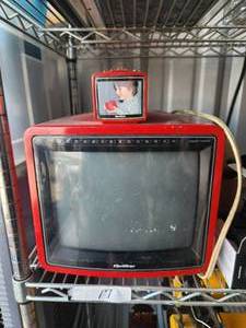 lot 17 image: Vintage Quasar TV with miniature radio