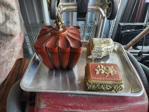 lot 57 image: Selection of musical jewelry boxes - wood needs adjusting to play properly