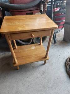 lot 73 image: Small wood table - microwave stand