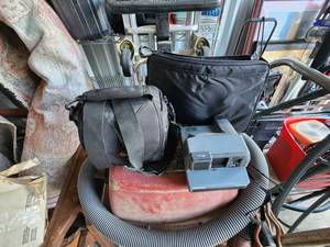 lot 115 image: Polaroid camera and 2 cases