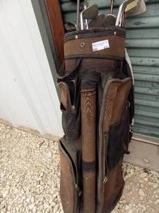 lot 405 image: GOLF CLUBS - WOODS - DYNACRAFT, LADY RAVE, TOUGH SHOTS-   IRONS - SPAULDLING  PLUS GOLF BAG