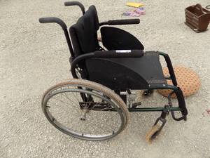lot 372 image: QUICKIE WHEELCHAIR-- NO SEAT CUSHION, SEE PICS OF WHEELS - IT ROLLS EASY AND IS FAST