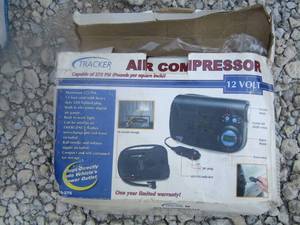 lot 73 image: Air compressor NIB box has minor damage