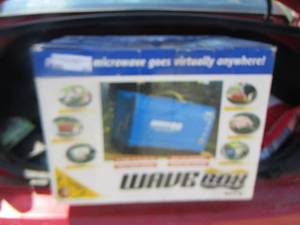 lot 85 image: New in box Wave box, compare to your standard microwave