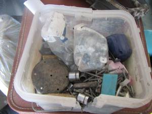 lot 145 image: small plastic tote with misc. items
