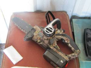 lot 146 image: battery operated mini hand held chain saw