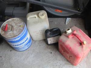 lot 210 image: kerosene can, gas can,  and more