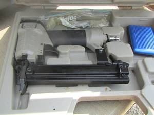 lot 233 image: porter cable nail gun