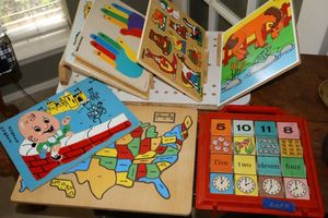 lot 11 image: Wooden puzzles and vintage Playskool toy