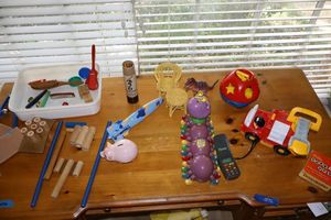 lot 12 image: Vintage toys musical toy set, Alphabet Pal caterpillar toy, fire truck and more