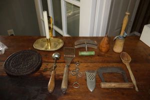 lot 10 image: Antique and vintage tools ice cream scoop, wax mold, 2-blade rocking cutter, Pestle and more