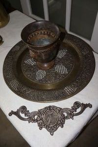 lot 33 image: Brass decorative tray and urn plus wall art hanging (some have made in India tags)