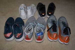 lot 25 image: Mens athletic shoes includes leather Vans. Sizes 10-11.5