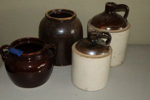 lot 23 image: Pottery jugs and brown jugs