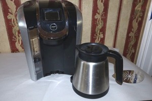 lot 44 image: Keurig coffee maker with Keurig Pitcher (made hot water when last used, been in storage)