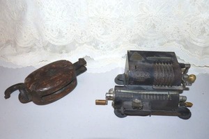 lot 56 image: Antique mechanical calculator and vintage wooden pulley with iron hook