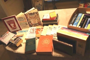 lot 61 image: Textbooks, DIY, writing , Large print puzzle book, and Spanish cassette tape set