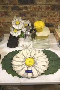 lot 161 image: Vintage plastic daisy serving trays, cast iron cornbread mold, corn on the cob dishes, insulated pitcher and vintage Tupperware