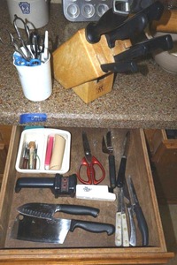 lot 188 image: Knives, knife block, scissors, and knife sharpeners