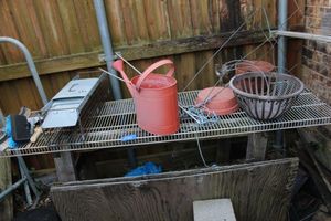 lot 271 image: Garden planters, small animal trap, watering can and more