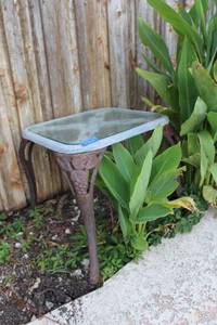 lot 262 image: Glass top side table with cast metal legs